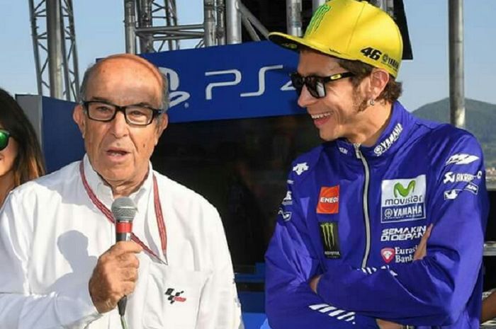 Carmelo Ezpeleta (CEO Dorna Sport) dan Valentino Rossi