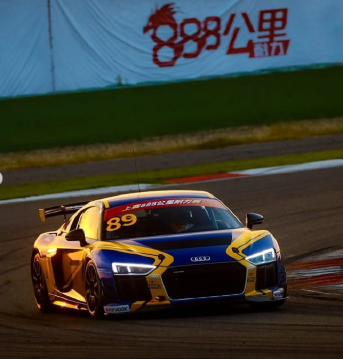 Rio Haryanto memakai mobil Audi saat balapan di SIC888