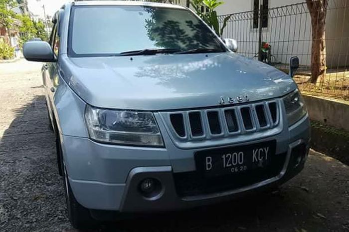 Suzuki Grand Vitara aroma Jeep Grand Cherokee