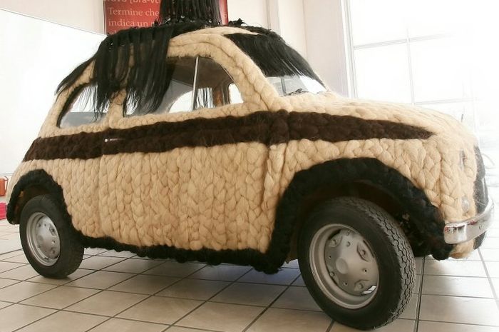 The Fiat 500 covered in human hair. See SWNS story SWHAIR; A stylist is selling her one-of-a-kind ca