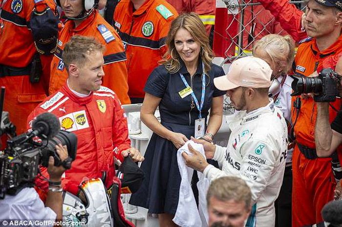 Mantan anggota grup vokal Spice Girls, Geri Halliwell ngobrol dengan Sebastian Vettel dan Lewis Hamilton usai lomba GP F1 Monako