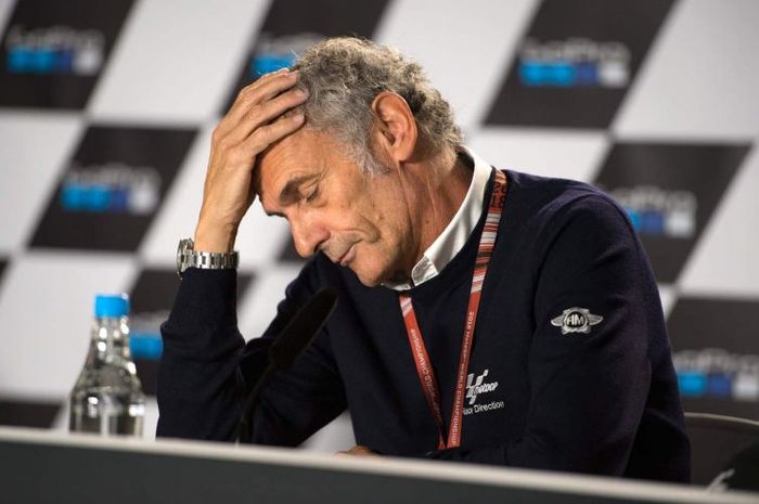 Franco Uncini saat melakukan konferensi pers usai pembatalan MotoGP Inggris