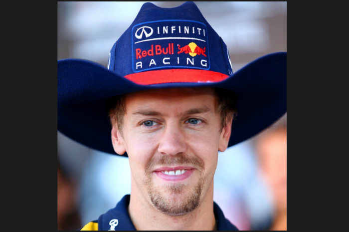 GP F1 Amerika di sirkuit Austin kental dengan nuansa koboi, ciri khas negara bagian Texas, seperti foto Sebastian Vettel ini pad 2014 ini