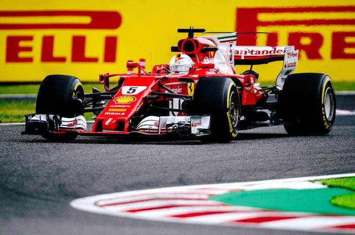 Sebastian Vettel dalam salah satu aksinya di sirkuit SUzuka, Jepang hari Jumat