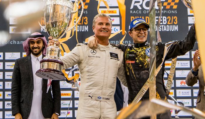 David Coulthard (kiri) dan Peter Solberg usai pertarungan di partai final Race of Champions 2018