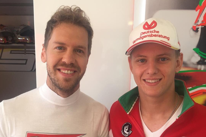 Sebastian Vettel dan Mick Schumacher