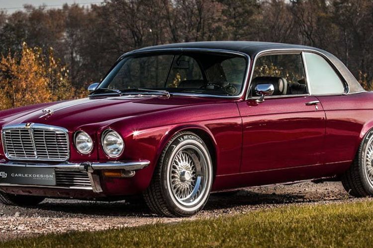 Ягуар XJ шильдик