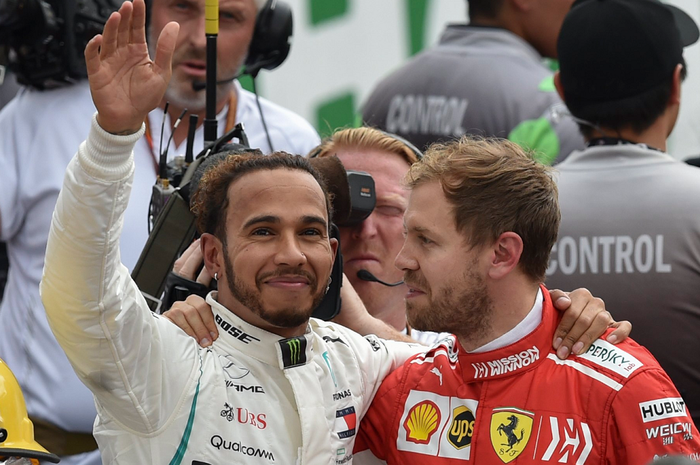 Lewis Hamilton dan Sebastian Vettel