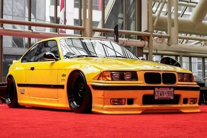 Modifikasi BMW M3 E36 1990 tampil kece dengan balutan warna Yellow Dakar 