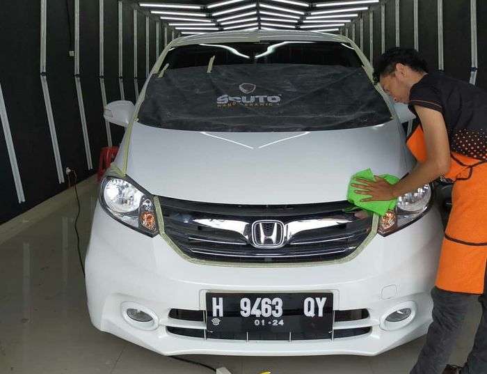 Proses coting mobil di Scuto