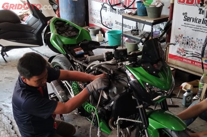 Proses gurah mesin motor