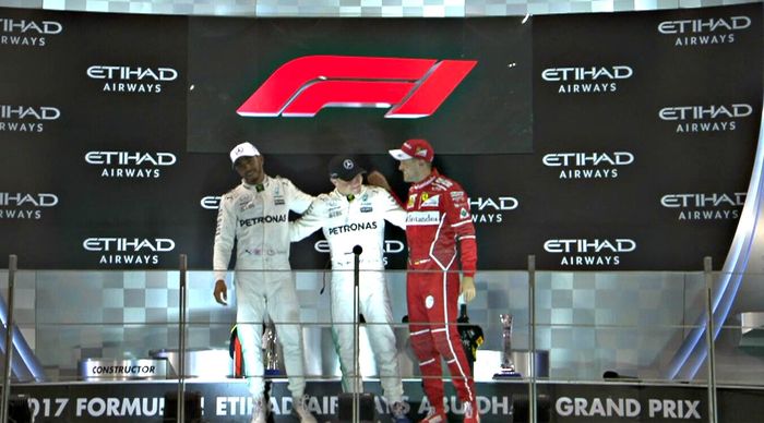 Podium F1 di GP Abu Dhabi tampil dengan logo F1 baru, Valtteri Bottas juara diikuti Lewis Hamiltan dan Sebastian Vettel di runner-up dan podium ketiga