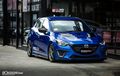 Mazda2 Tampil Sporty, Kaki-kaki Merunduk Pakai Warna Subaru WRX STI