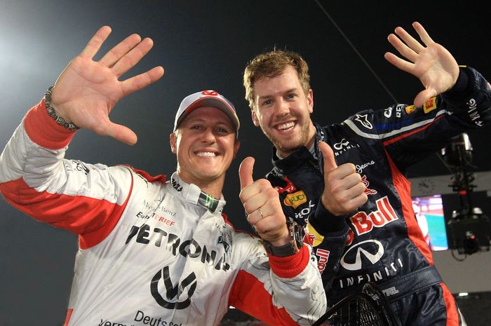 Michael Schumacher dan Sebastien Vettel ketika mengikuti event Race Of Champions 2012