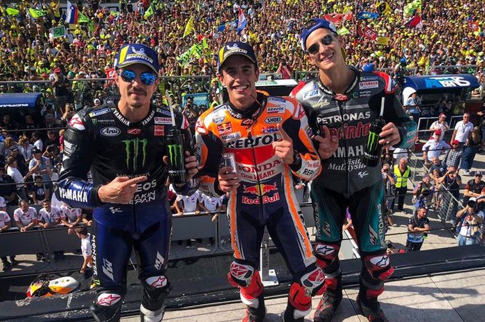 Marc Marquez menjauh dari Andrea Dovizioso usai MotoGP San Marino 2019