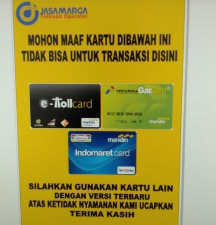Sebuah gambar yang menyatakan kartu E-Money, milik Bank Mandiri tidak bisa digunakan untuk bertransaksi di jalan tol