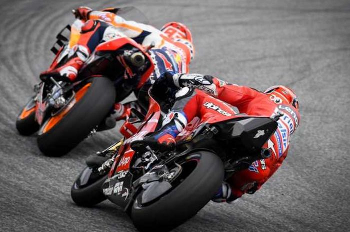 Duel Andrea Dovizioso dan Marc Marquez di tikungan dan lap terakhir sudah kejadian 6 kali sejak 2017 silam