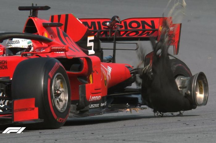 Ban belakang kiri mobil Sebastian Vettel pecah setelah bersentuhan dengan ban mobil Charles Leclerc menjelang F1 Brasil selesai