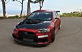 Timur Tengah Punya Gaya, Mitsubishi Evo X Padu Warna Merah Candy dan Aksen Serat Karbon