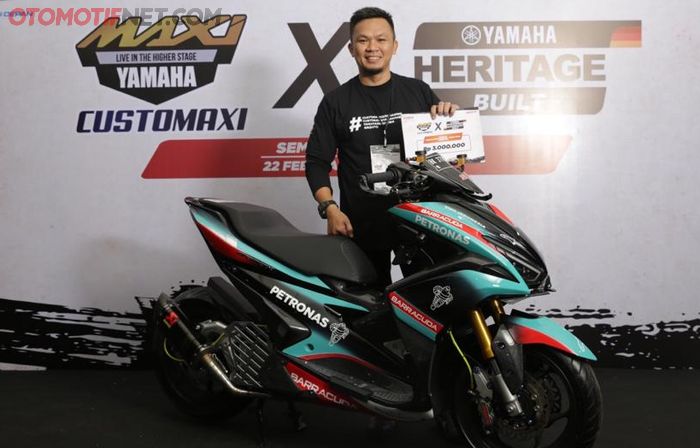 Edy menyebut, modifikasi Yamaha Aerox berkonsep racing, &quot;Makanya pakai balutan body bertema Petronas Yamaha SRT di MotoGP,&quot; tuturnya.