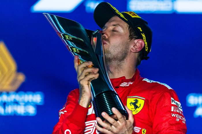 Sebastian Vettel mengantar tim Ferrari 4 kali meraih posisi runner up