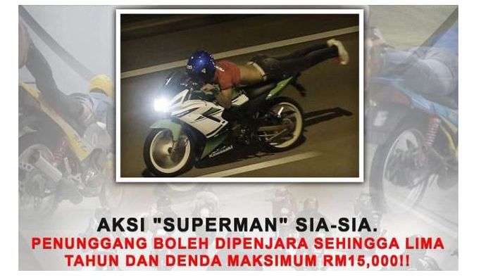 Poster larangan gaya Superman di Malaysia