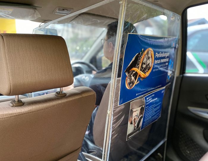 Ilustrasi. Sekat partisi hasil kolaborasi Grab dan Mobil Lubricants.