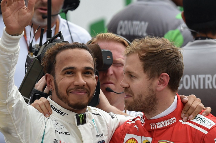 Lewis Hamilton dan Sebastian Vettel