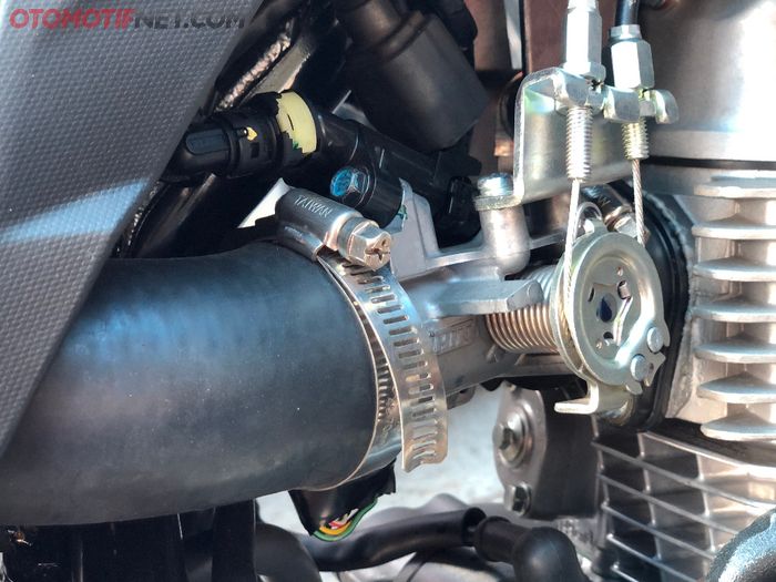 Throttle body CB150R di-reamer menjadi 34 mm dengan injector CRF250 12 lubang