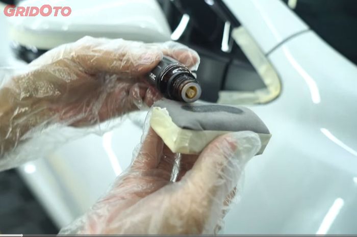 Ilustrasi coating di mobil bekas