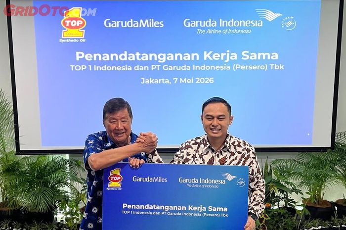 Simbolis penandatanganan kerja sama TOP 1 dan Garuda Indonesia