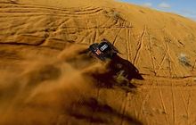 Mirip Spider-Man, Mobil Hybrid Audi Carlos Sainz Merambat Dinding Bukit Pasir di Reli Dakar 2023