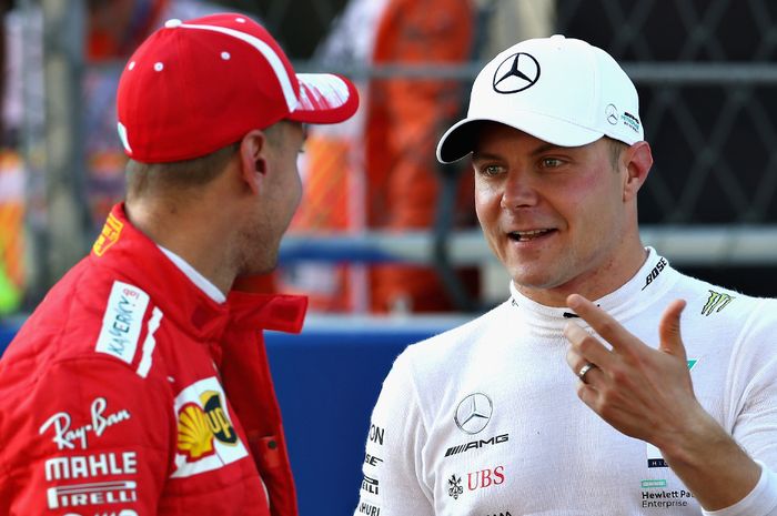 Valtteri Bottas (kanan) mengaku kalau Sebastian Vettel bukanlah pilihan untuk menemani Lewis Hamilton