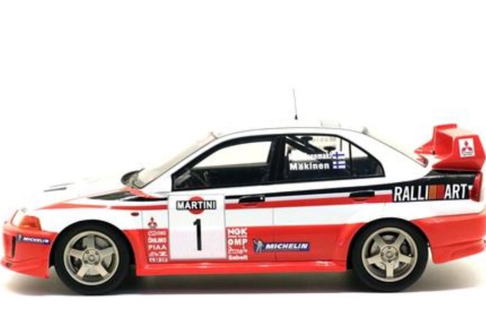 Diecast atau miniatur mobil Mitsubishi Lancer Evolution V Tommi Makinen