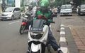 Ojek Online Ditilang Karena Main Ponsel, Setuju atau Tidak?