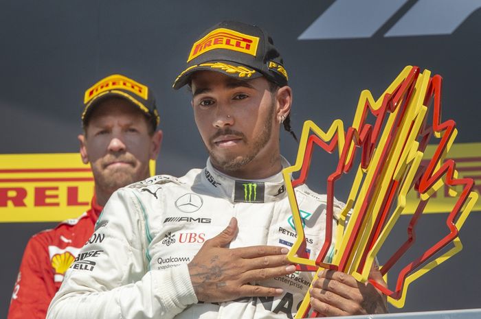 Lewis Hamilton memenangkan GP F1 Kanada 2019,  setelah pertarungan kontroversial dengan Sebastian Vettel
