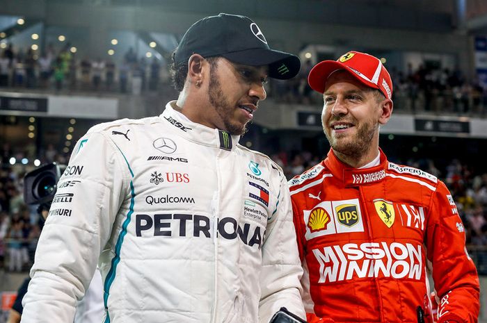 Lewis Hamilton dan Sebastian Vettel usai kualifikasi GP F1 Abu Dhabi