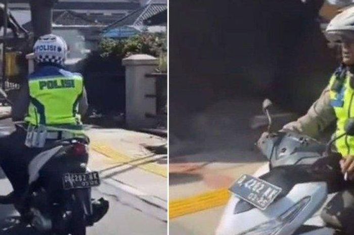 Polisi terciduk bawa motor sambil nyebat di jalan, berakhir kena sanksi atasan