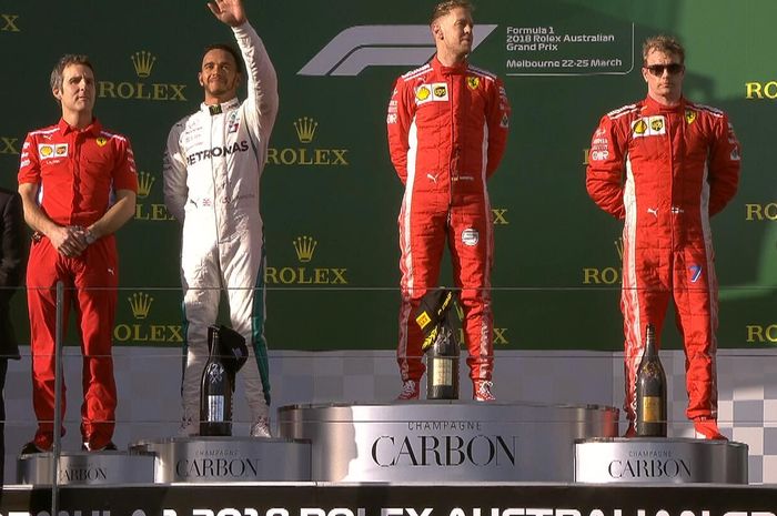 Podium GP F1 Australia Sebastian Vettel di puncak podium diikuti Lewis Hamilton (podium 2) dan Kimi Raikkonen (podium 3)