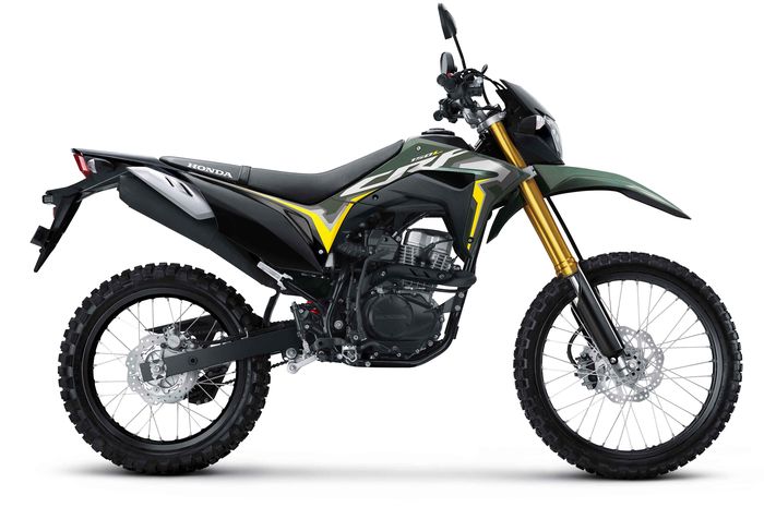 New Honda CRF150L warna baru Extreme Green tampil sangar dengan stripe kuning yang kontras serta swing arm hitam