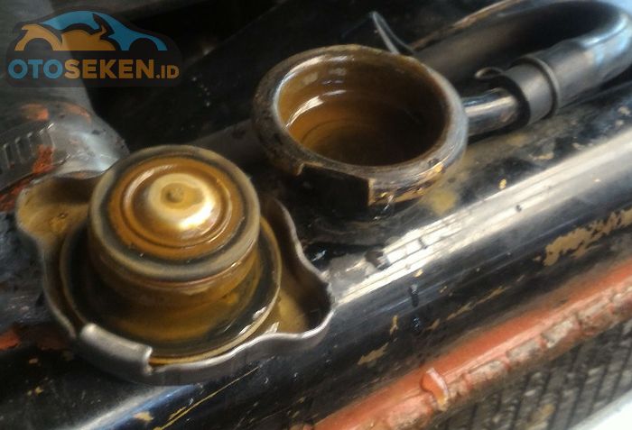 BUKA TUTUP RADIATOR