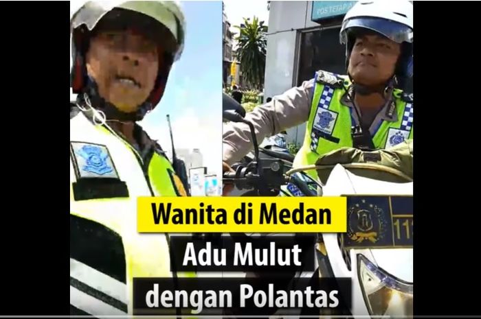 Wanita berdebat dengan polisi