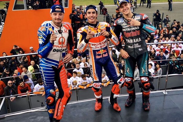 Marc Marquez diapit Fabio Quartararo dan Jack Miller di podium MotoGP Valencia 2019