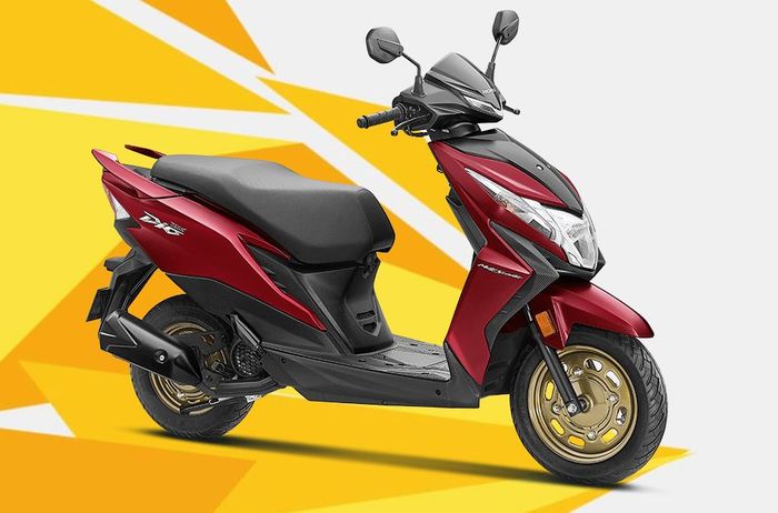 detail tampilan Honda Dio 2023, tampangnya sporty berkat bodi gambot dan penggunaan pelek warna gold.