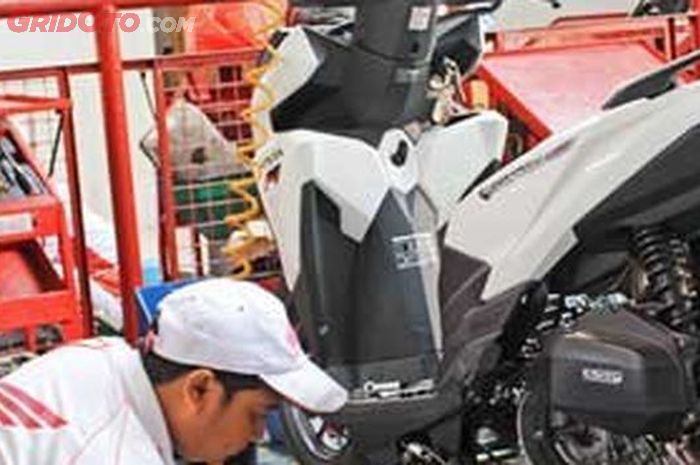 Ilustrasi servis motor Honda
