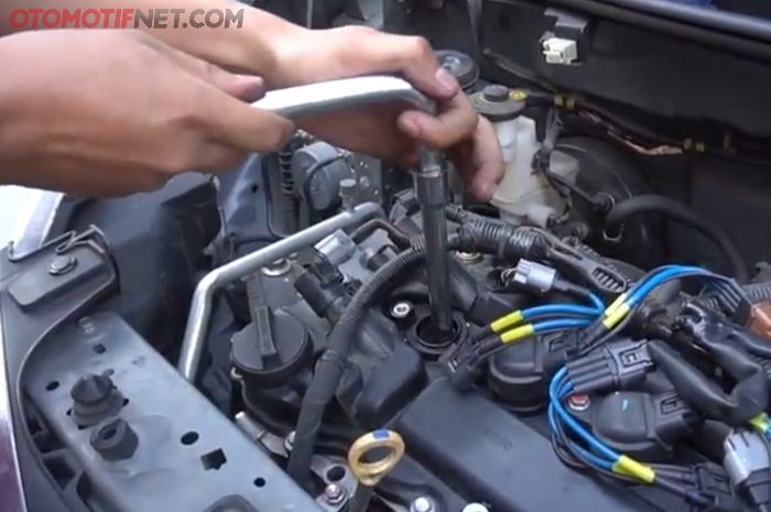 Pergantian busi mobil setelah terendam banjir