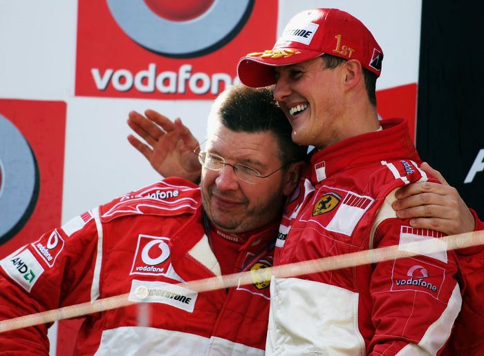 Michael Schumacher (kanan) masih memegang kemenangan terbanyak dalam sejarah balap F1