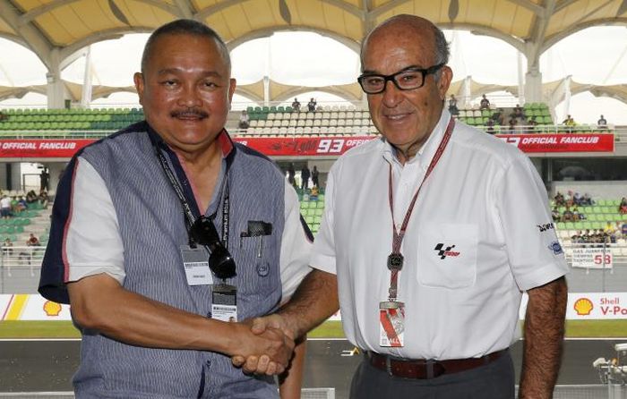 Alex Noerdin (kiri) Gubernur Sumatera Selatan bersama Carmelo Ezpeleta bertemu di GP Malaysia 2016 mengajukan Palembang jadi host MotoGP