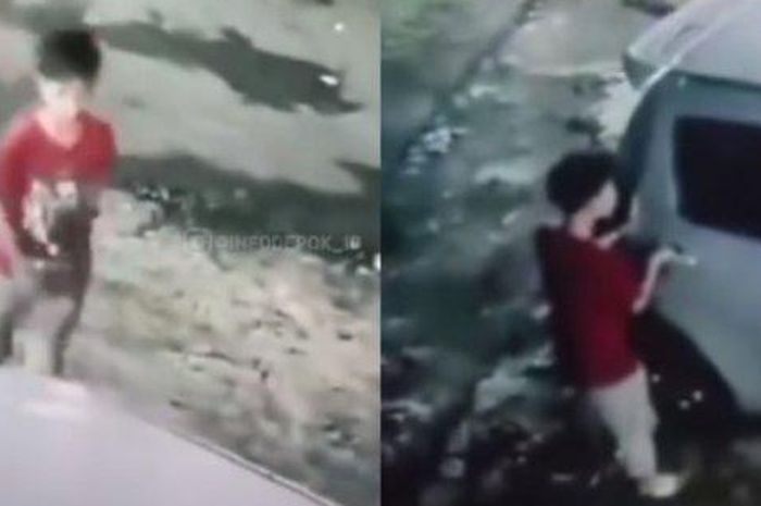 Bocil berbaju merah gasak tas dan laptop di sebuah mobil yang sedang terparkir di Depok