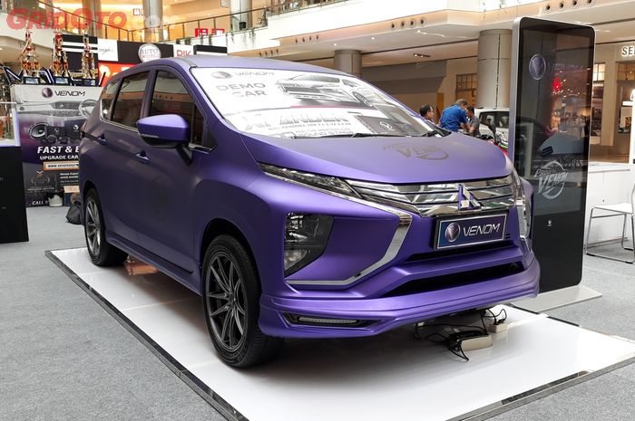 Mitsubishi Xpander tampil lebih bergairah dengan wrapping sticker ungu dan body kit custom